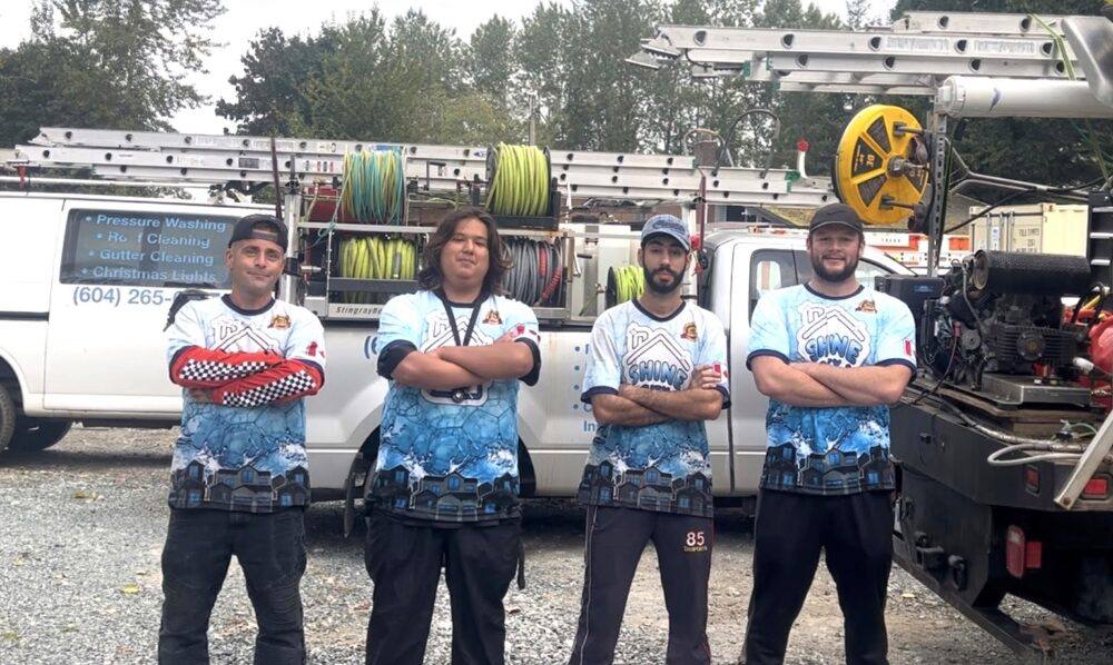 Four Shine City crew members together on a job
